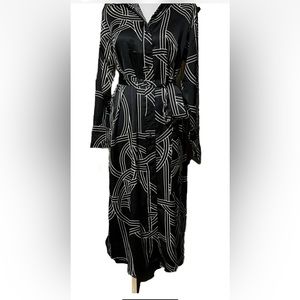 Brandnew H&M Calf-length dress in softly draped satin with a printed pattern.